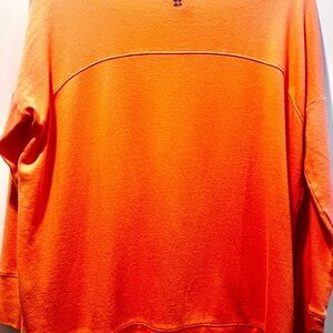 Orange Sweaty Betty oversize sweater